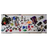 Assorted Toy Vehicle and Action Figure Collection