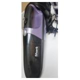 Shark Cordless Vacuum and Bell+Howell Power Strip