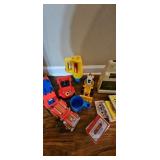 Assorted Toy Collection and Audio Cassettes