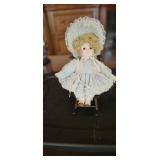 Vintage Porcelain Doll with Miniature Wooden Rocki