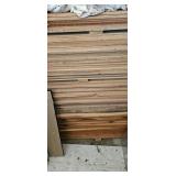 Stack of Dry Lumber Including Cedar Boards