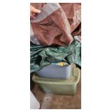 Stack of Tarps With Storage Bins Assortment