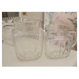 2 Clear Pressed Glass Pitchers