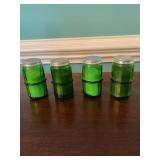 Four Green Glass Shakers With Lids