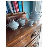 White Porcelain Tea Set with Decorative Relief