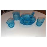 4 blue glassware