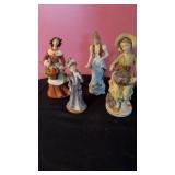 4 lady fgurines