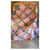 Hand stitched pink quilt