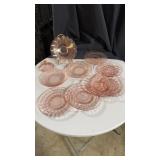 Pink depression plates (misc) and one lid