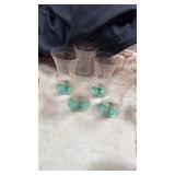 5 pink depression stemware with green bottom