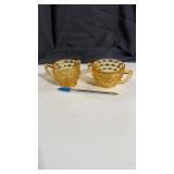 Cream and sugar in yellow