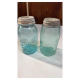 2 blue jars