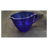 Blue measuring cup