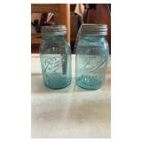 2 blue jars