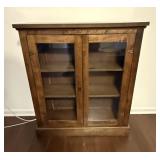 Primitive 2 dr glass cabinet