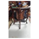 Mah. Side table with swan carving