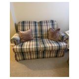 Loveseat in basement