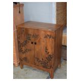 LOT 1050 MAHOGANY 2 DOOR CABINET WITH INCISED LEAVES
