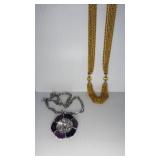 Silvertone Cupid / Multi Strand Gold Tone Necklace