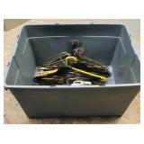 Tote Filled With Assorted Coat Hangers