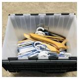 Tote Filled With Assorted Coat Hangers