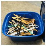 Tote Filled With Assorted Coat Hangers