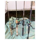 4 fishing rods w/ reels