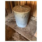 Metal Garbage Can, 3/4 full Bag of Sunflower Seed