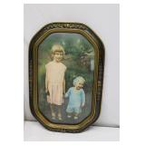 Antique Oval Convex photograph of two children.