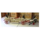 Vintage cast iron horse drawn fire engine ladder