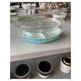 Vintage Pyrex divided dish with divided lit and