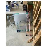 Three toilet safety rails and 2 canes