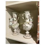 Pair Of Figural Porcelain Mantle Vases With Cherus