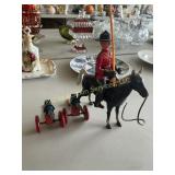 Mounted mounty and two canons
