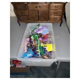 Container of party jewelry