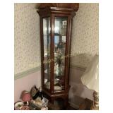 Lighted curio cabinet with glass shelves. NO