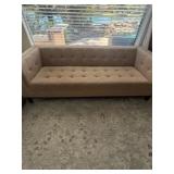 Tufted sofa