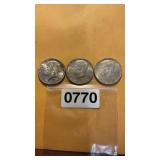 Three ï¿½ half dollars 1964