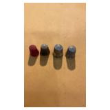 Four miscellaneous thimbleï¿½s