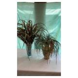 Greenery with vases