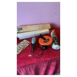 Visqueen plastic, trouble lamp with reel