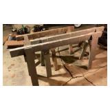 Two sets of wooden saw horses