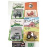 ERTL & Hesston 1/64 Die-Cast Tractors (4)