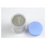 Roll of 20 Walking Liberty Half Dollars.