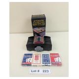 AUTOMATIC PLAYING CARD SHUFFLER AND PLAYING CARDS