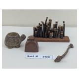 STONE TURTLE CANDLE HOLDER, MINI COW BELL, AND FAM