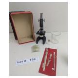 TELESCOPE WITH BEAKER, SLIDES, AND TOOLS