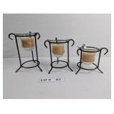 DECORATIVE METAL CANDLE HOLDERS AND CANDLES