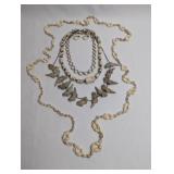 SHELL AND CARVED NATURAL STONE NECKLACES