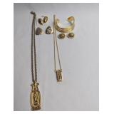GOLD TONE PENDANTS AND NECKLACES, BRACELETTE, AND